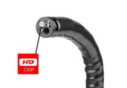 Зблизька дистальний кінець ветеринарного ендоскопа, що демонструє обєктив HD, світловоди та інструментальний канал